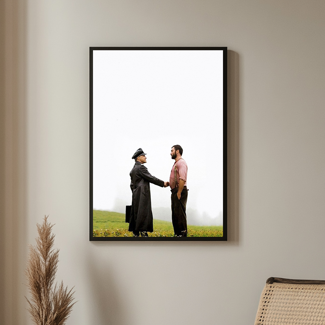 Framed minimalist artwork featuring two men shaking hands in an open field with a stark white background, conveying a timeless moment of connection.