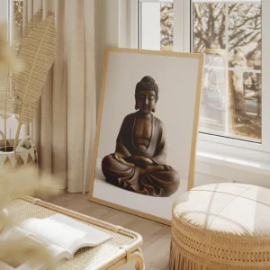 Framed minimalist art of a bronze Buddha statue in meditation, displayed in a beige wood frame, perfect for calm and natural-themed interiors.