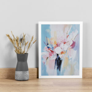 Framed abstract artwork featuring vibrant floral brushstrokes in shades of pink, blue, and white, set against a soft pastel background.