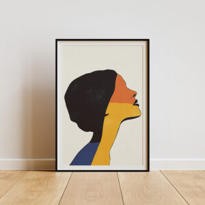 Framed abstract poster featuring a colorful silhouette profile in shades of orange, yellow, and blue, displayed on a wooden floor against a light wall.